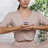 woman-holding-purple-crystal-home